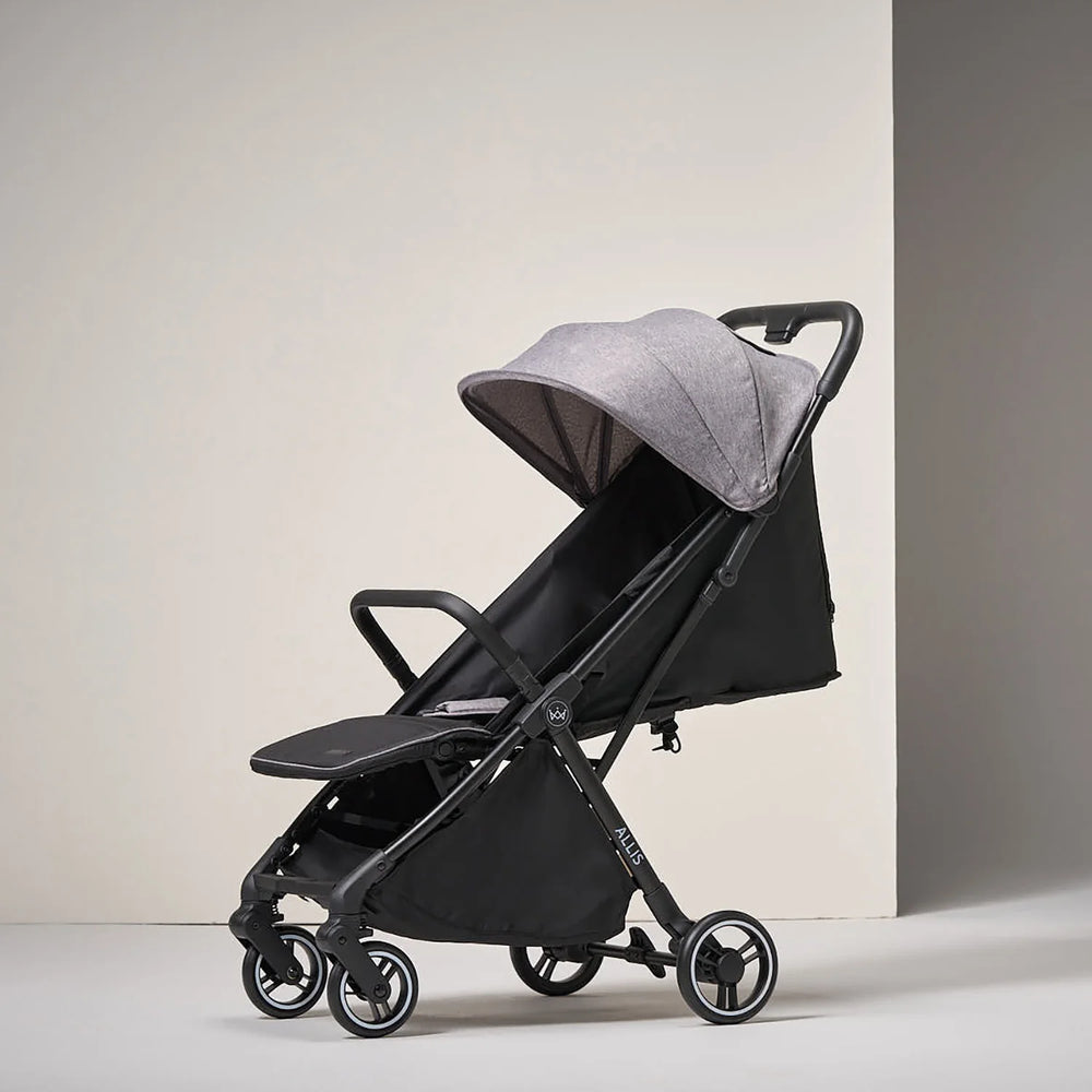 Side view of lightweight baby stroller with UPF 50+ canopy open - Grey