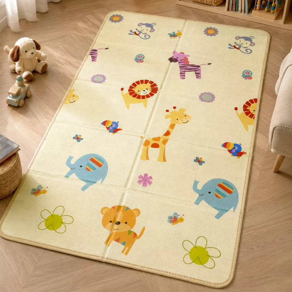 Allis play mat fully laid out — bright animal theme side with lions, giraffes & friendly characters