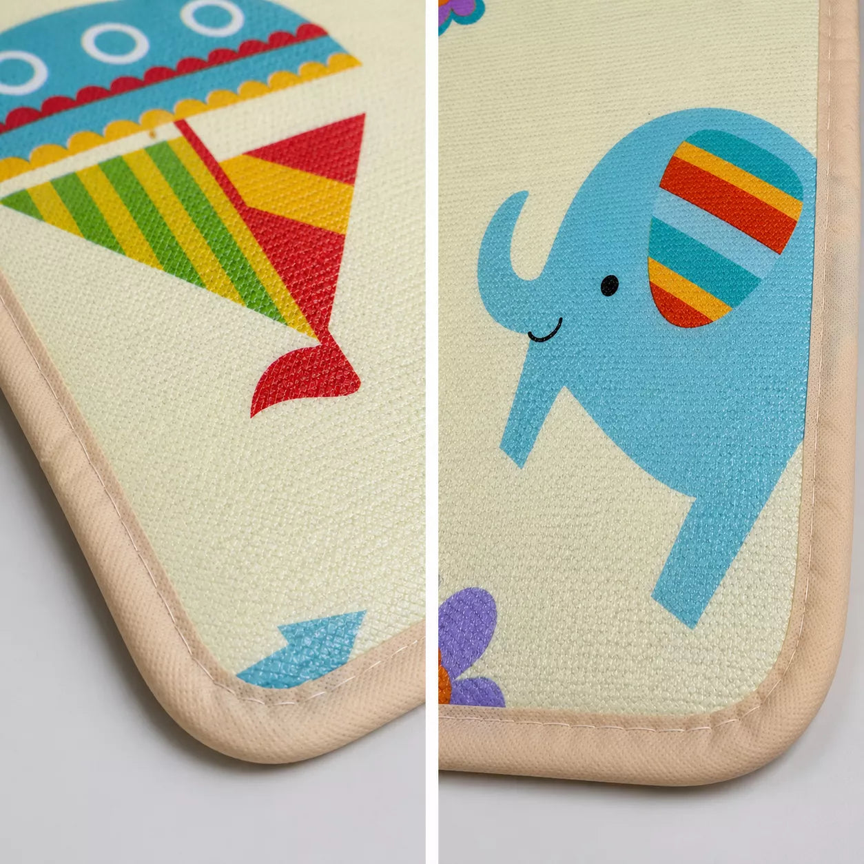 Close-up of Allis play mat edge — soft stitched polyester binding, smooth safe finish