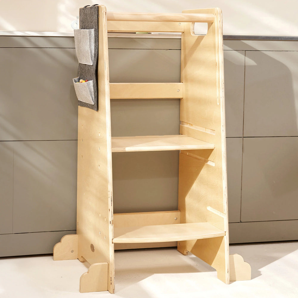 Place toddler kitchen helper by the counter for safe food prep fun or imaginative play.