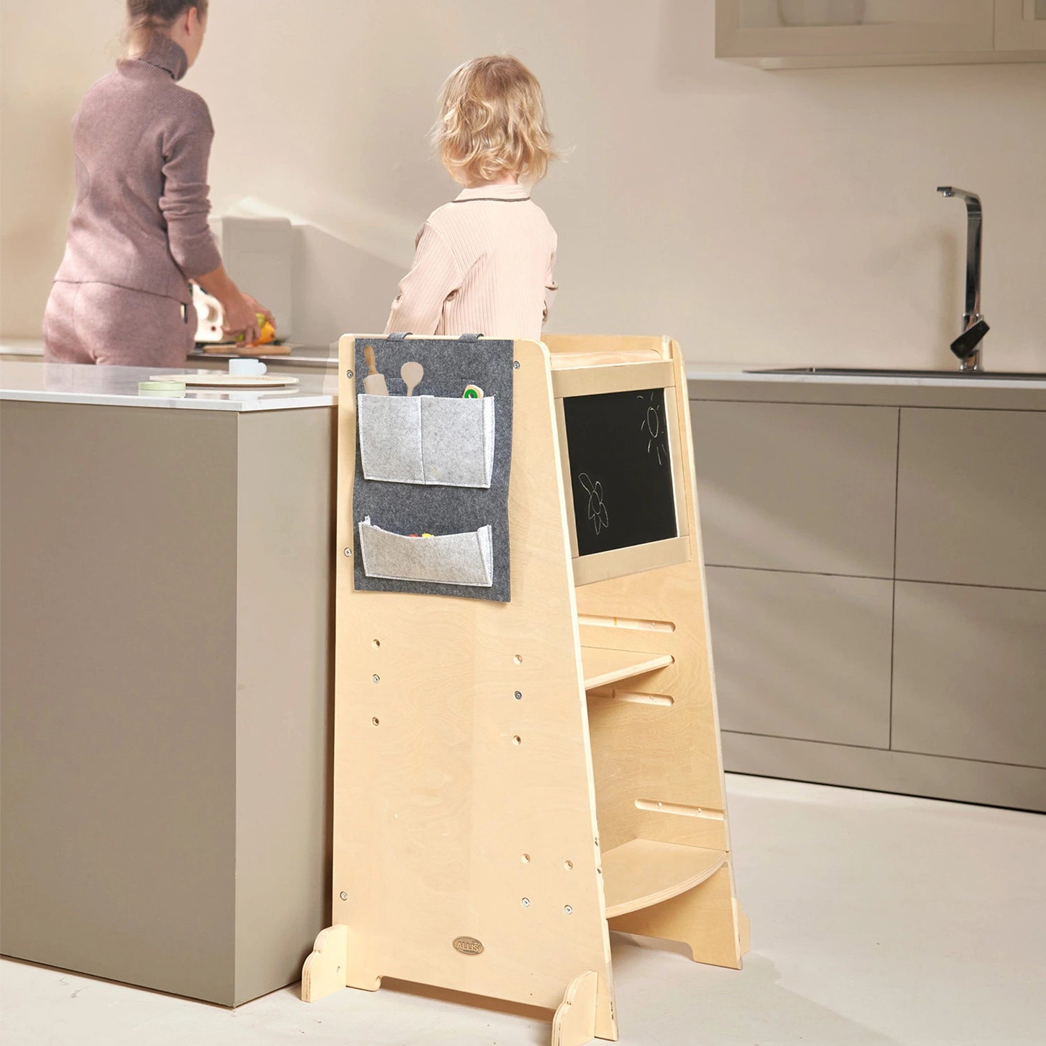 The toddler kitchen helper aids in the development of independence and confidence in daily tasks.
